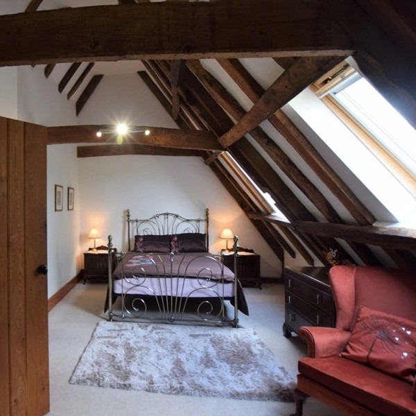 bedroom with beams